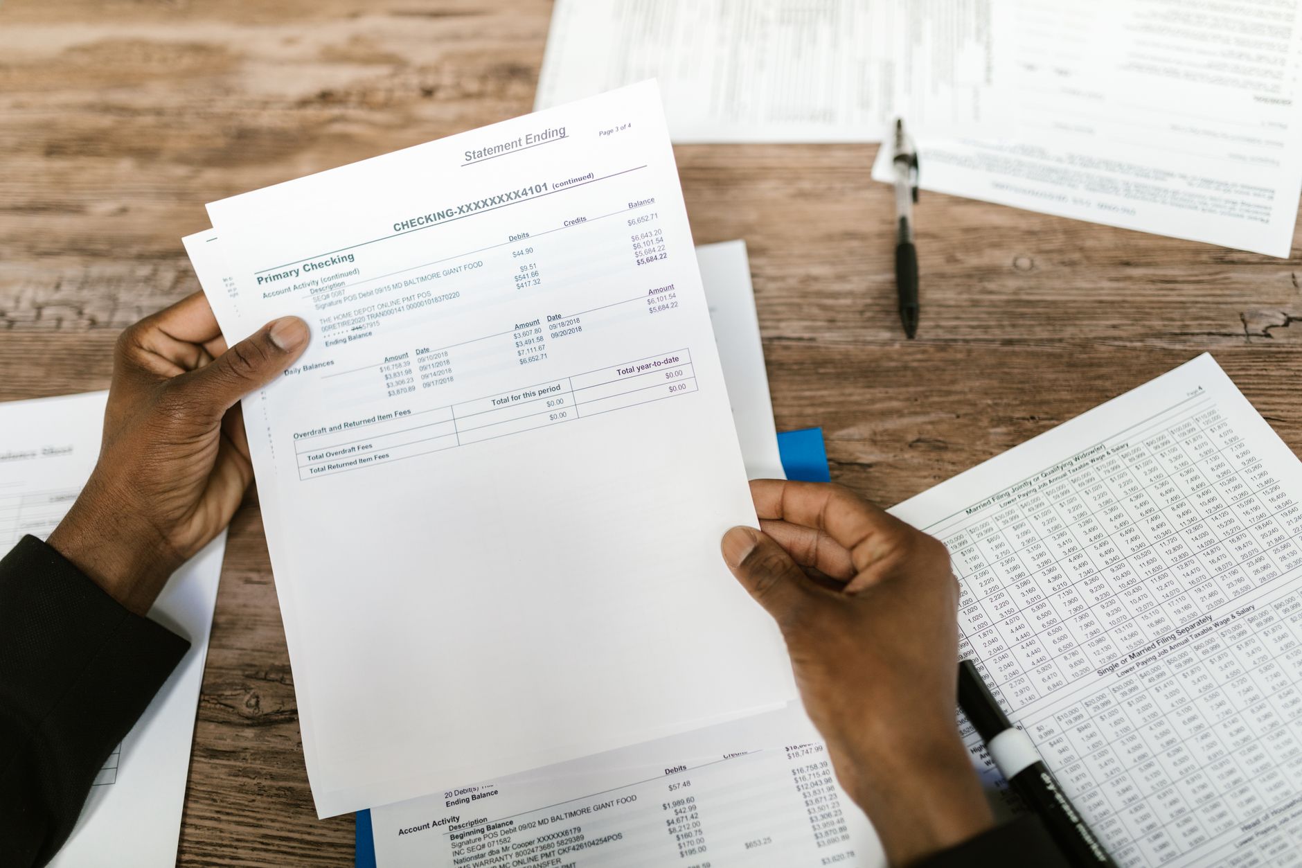 Operations manager reviewing census data and admissions metrics at a treatment center