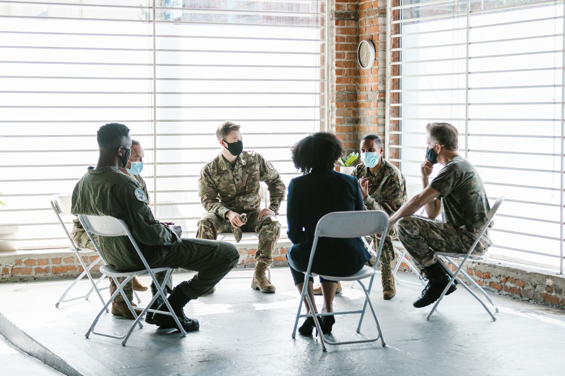Alumni group meeting in a community room at a recovery center
